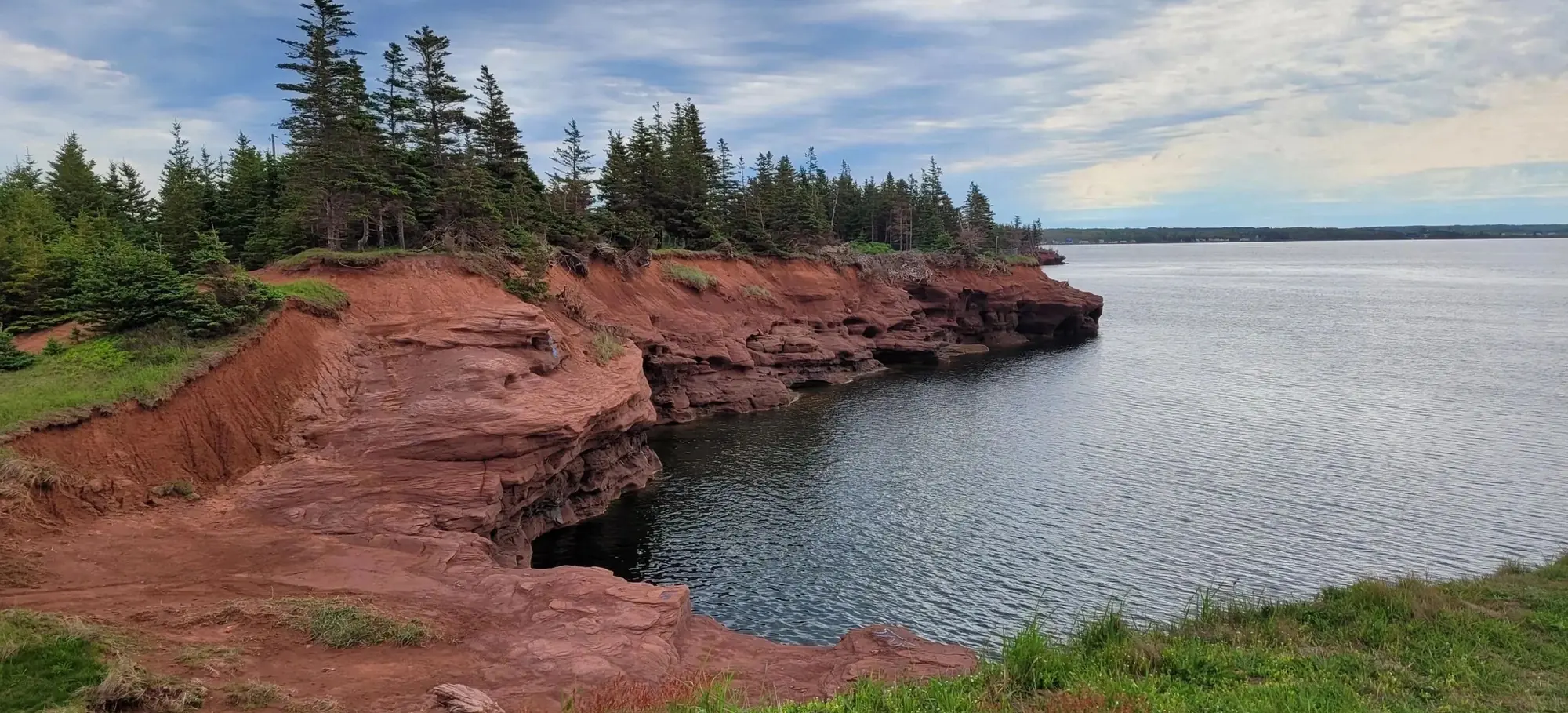 Red sandstone cliffs and a cove on the Northumberland Strait, below the Coastal Knook