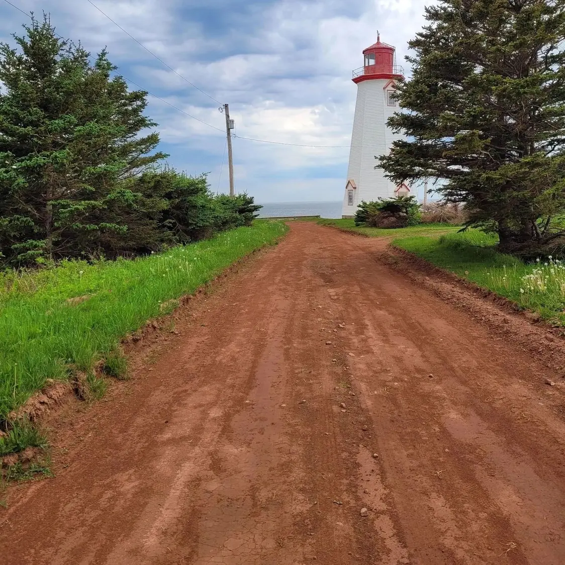 A red dirt lane leading to Seacow Head Lighthouse