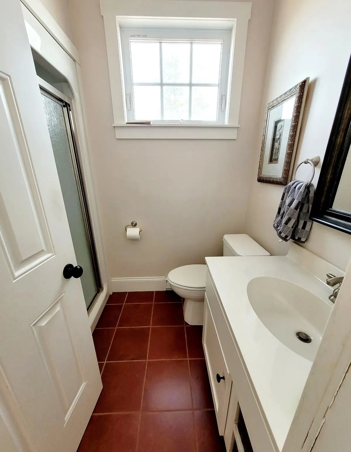 Bathroom with a tub and shower and a tiled floor