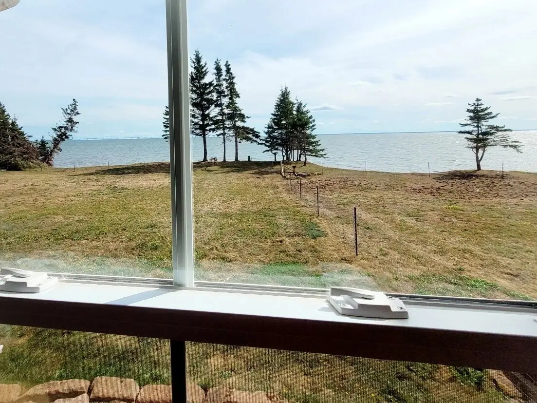 Window ledge inside a guest room, with the strait in view