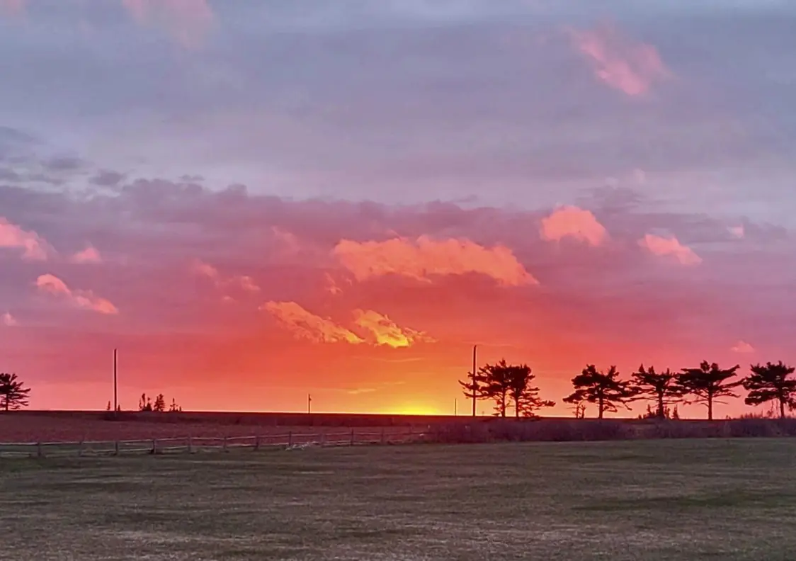 A pink spring sunset over the strait from the Knook, a few days before the season opens