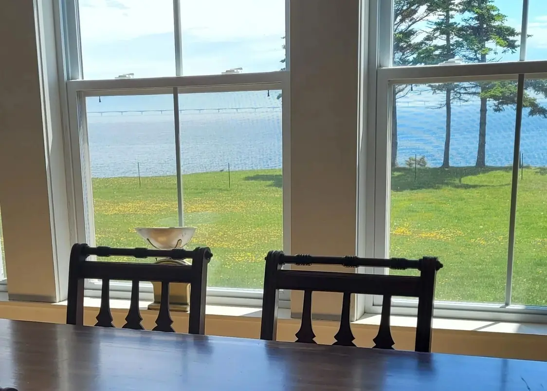 Window seat and benches in the common room, facing the water